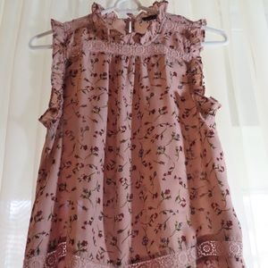 Pink floral blouse